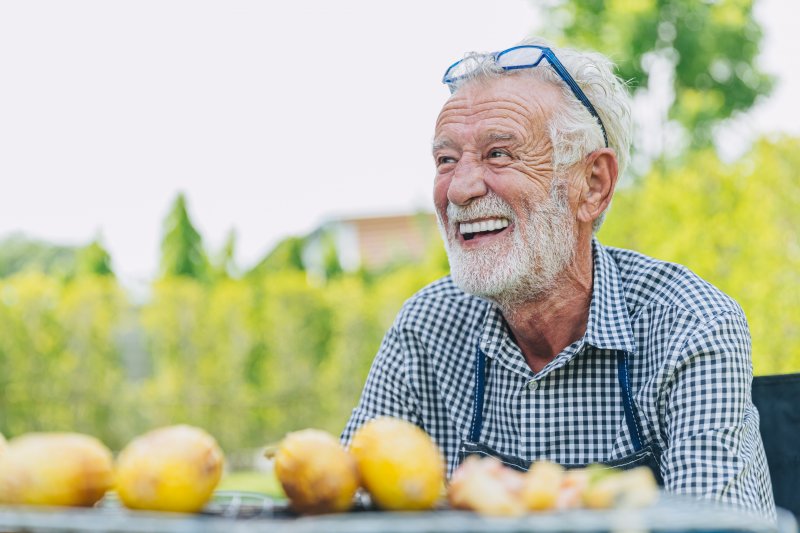 older man with dentures  